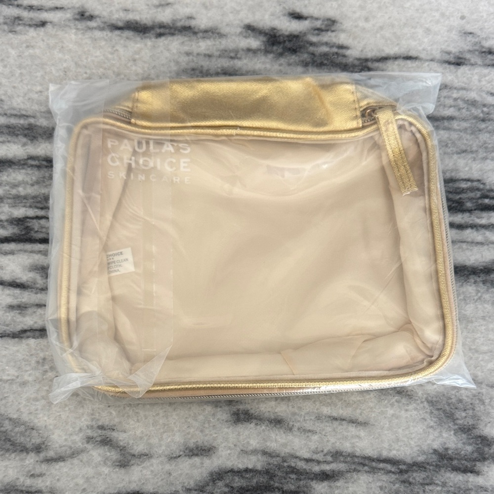 Paula’ Choice gold makeup bag